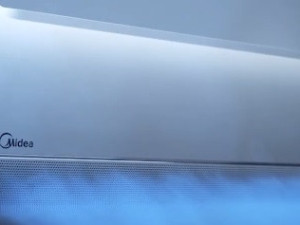 Midea BREEZELESS -S 12 INVERTER A+++ -25 SA GRIJACIMA — fotografija 1